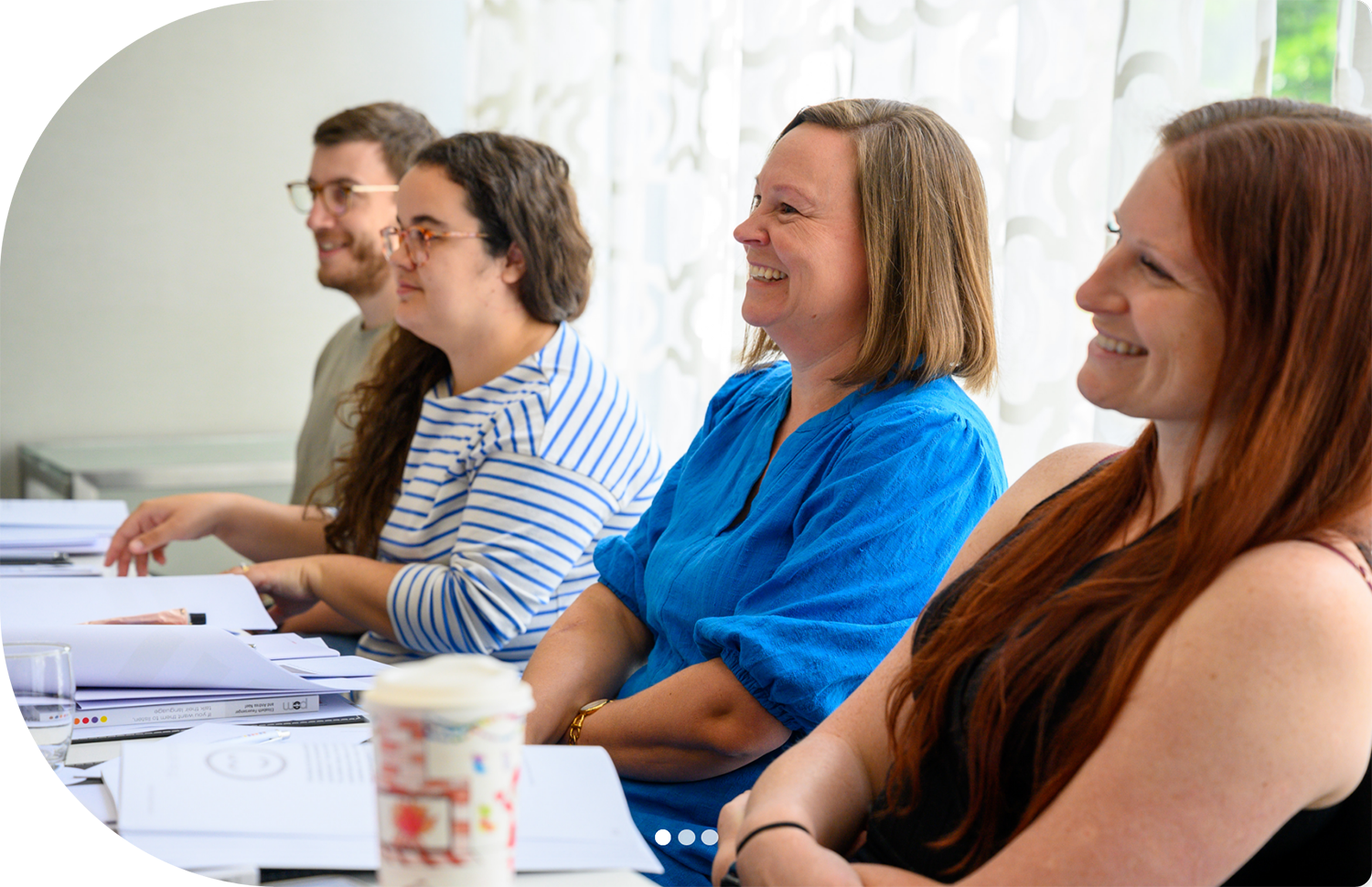 a photo of four people attending a course for personality assessment certification in PCM